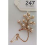 A 9ct gold and cultured pearl tree brooch, 4cm long.