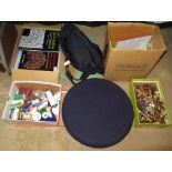 A large quantity of laced bobbins, books and other related sewing requisites.
