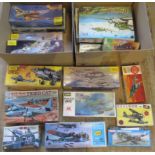 Two boxes containing a quantity of miscellaneous aviation model kits, to include: Leo 451 by Heller,