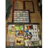 Two boxes containing a large quantity of cigarette cards, both loose and in albums,