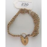 A 9ct gold link bracelet with a padlock clasp.