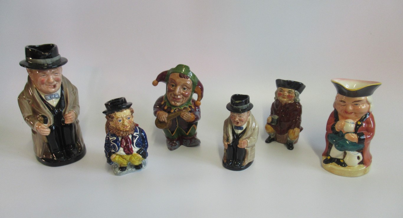 A collection of six various Toby jugs, to include: a large figure of Winston Churchill,