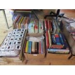 Six boxes containing a large quantity of books, to include: Rupert annuals,