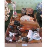 Two boxes containing a quantity of various china and wooden animals, to include: cat, elephant, pig,