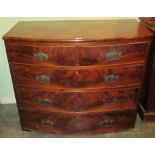 A Victorian mahogany bow front chest of two short over three long drawers.