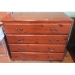 A pine chest of four long drawers.