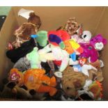 A box containing approximately fifty Ty Beanie Babies.