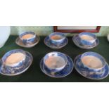 A set of six Miles Mason blue and white cups & saucers with Oriental decoration.