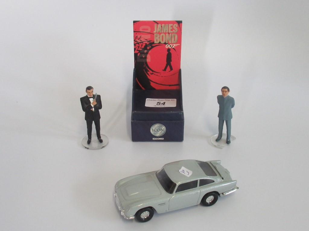 A Corgi Aston Margin DB5, together with two James Bond 007 figures.