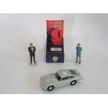 A Corgi Aston Margin DB5, together with two James Bond 007 figures.