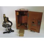 An early 20th century cased microscope by Voigtlander, Braunschweig, serial no. 50639 circa 1920.