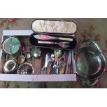 A box containing a large quantity of various silver plate and flatware.