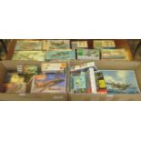 Two boxes containing a large quantity of boxed aviation model kits, some still in sealed bags,