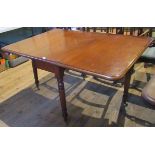 A Victorian mahogany single drawer drop-flap table.