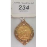 An Edwardian sovereign dated 1902, in a carved and engraved 9ct gold pendant mount, gross weight 13.