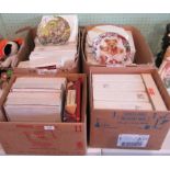 Four boxes containing a large quantity of limited edition plates.