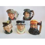 A collection of five Royal Doulton character jugs, comprising W G Grace, Robin Hood, Rip Van Winkle,