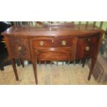 A mahogany sideboard.