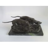 A 20th century bronze of two hunting dogs on a marble plinth, bearing the name B C Zheng.