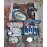 A box containing a quantity of various silver plate and flatware.