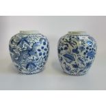 A pair of 19th century Chinese blue and white spice jars, marks to base.