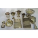 A box containing a quantity of various hallmarked items, to include: cigarette box, trophy cup,
