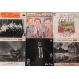 A quantity of thirty vinyl LP's, to include: Monty Python, Tony Hancock and jazz related music.