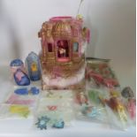 A She-ra castle, together with many accessories, to include: Heart of Gold outfit, Claudeen,