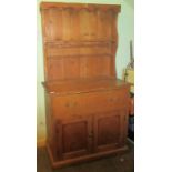 A 19th century pine dresser.