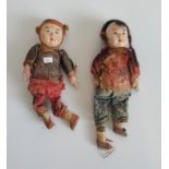 Two early 20th century Chinese papier mache headed dolls,
