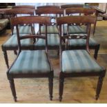 A set of eight Victorian rosewood near matching dining chairs,