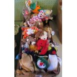 Two boxes containing approximately fifty Ty Beanie Babies.