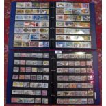 A collection of all world stamps, contained in eight albums.