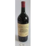 A bottle of 1985 Chateau Haut-Marbuzet, 150cl.