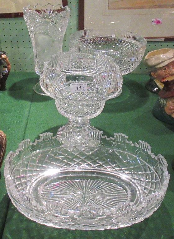 A collection of four large pieces of Waterford crystal, to include: an etched vase,
