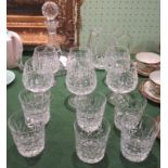 A suite of Waterford crystal, comprising: ship's decanter and stopper, water jug,