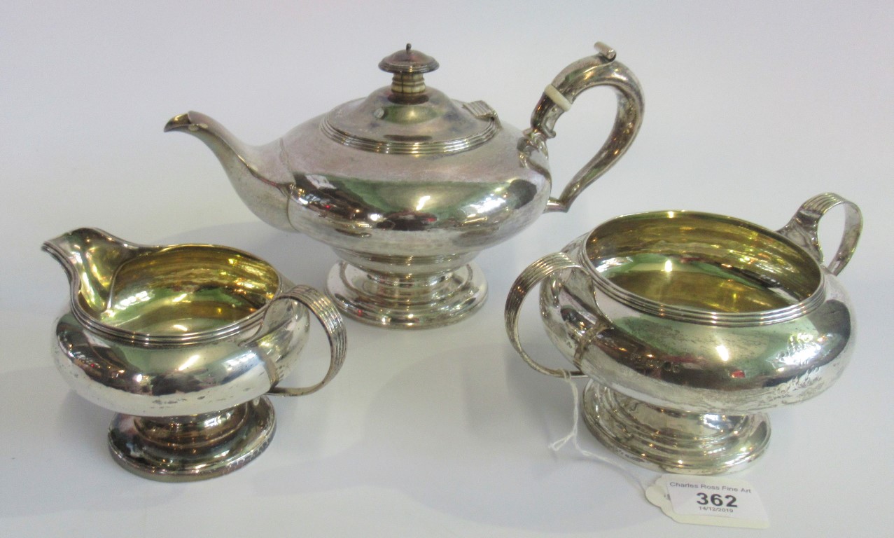 A 19th century hallmarked three piece tea service, London 1824, approximately 36 ounces.