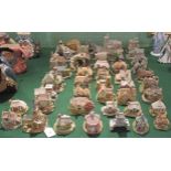 A collection of forty-seven Lilliput Lane Cottages, to include: St Lawrence Church,