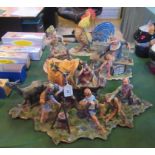 A collection of four Capodimonte figurines, to include The Encampment,