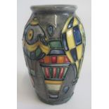 Jeanne McDougall, a Moorcroft Balloon pattern squat baluster vase, 11cm high.