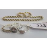 A pair of 9 carat gold hoop earrings, a 9 carat gold rope twist bracelet,