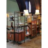 A mid-20th century five section Ladderax wall unit, having central glazed two door cabinet,