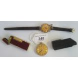 A Dunhill lighter, together with a yellow metal pocket watch and a yellow metal wristwatch.