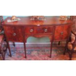 A mahogany bow front sideboard,