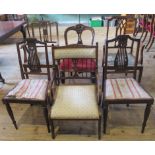 A collection of six miscellaneous dining chairs.