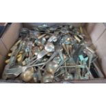 A large quantity of silver plated flatware.