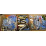 Three boxes containing a large quantity of railway related items, to include: carriages,