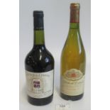 A bottle of Cote de Rhone, together with a bottle of Chardonnay.