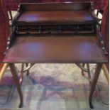 A reproduction mahogany rising top ladies writing desk.