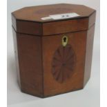 An inlaid tea caddy.